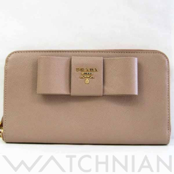 ラウンド長リボン1M0506 ラウンドファスナー長財布 ベージュ/ゴールド金具 1M0506 型押しカーフレザー PRADA プラダ レディース  【中古】